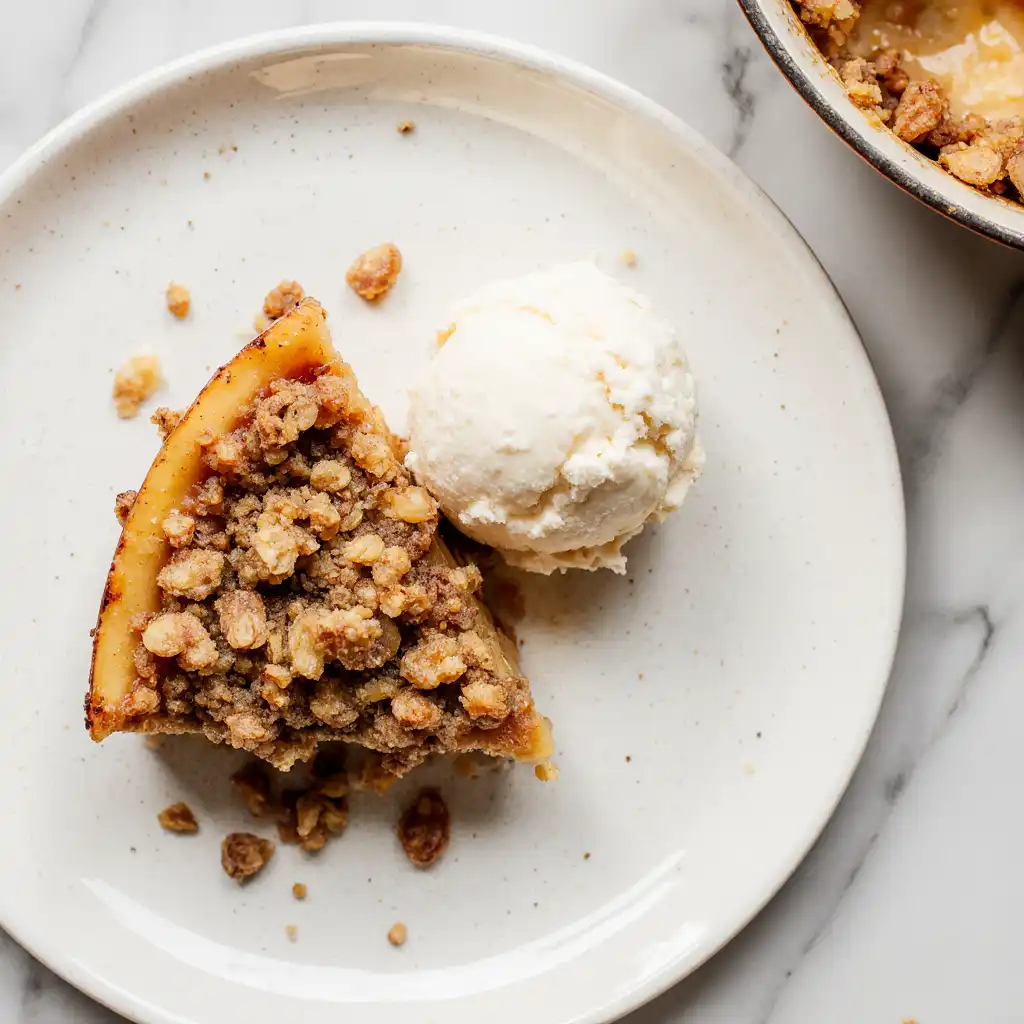 Apple Crisp Recipe with Oats Plated with Ice Cream